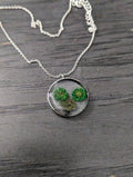 Botanical resin pendants